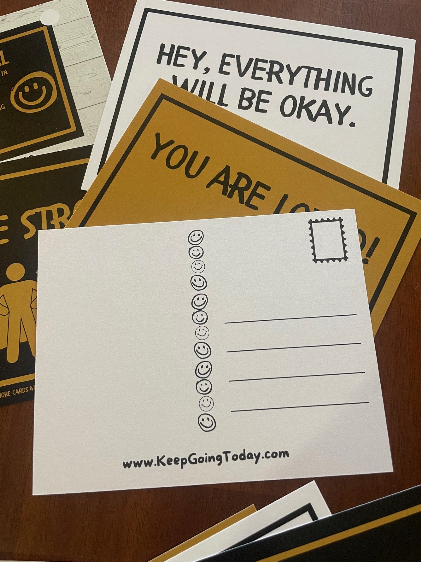 20 cards of encouragement—hang them, mail them, and share the love—adhesive included Black & Gold